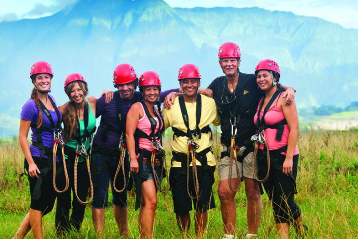 a group posing after a ziplining adventure