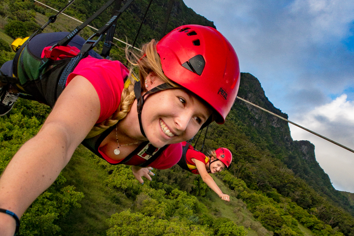 2 girls ziplining