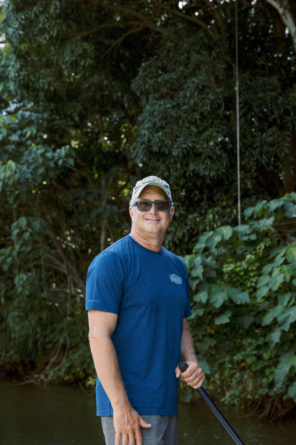 Guide with Outfitters Kauaʻi on the Huleʻia River, part of our Kauaʻi kayak and adventure tours.
