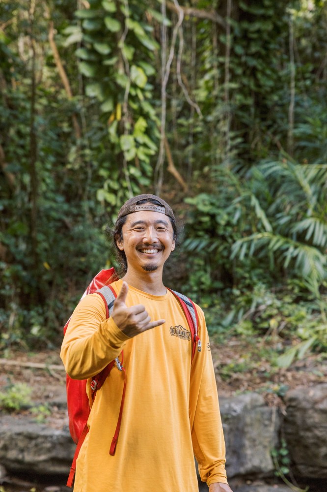 Outfitters Kauai guide hiking to Hidden Falls on a Kauai kayak and waterfall adventure tour in Lihue