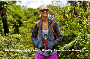 Guide leading a group through a lush forest trail on Kauaʻi during an outdoor adventure